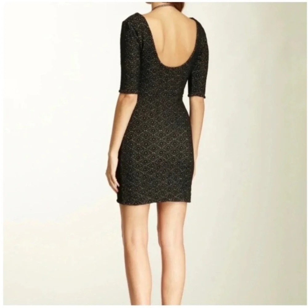 Free People Lady Pucker scoop back bodycon dress black mini stretch fitted med